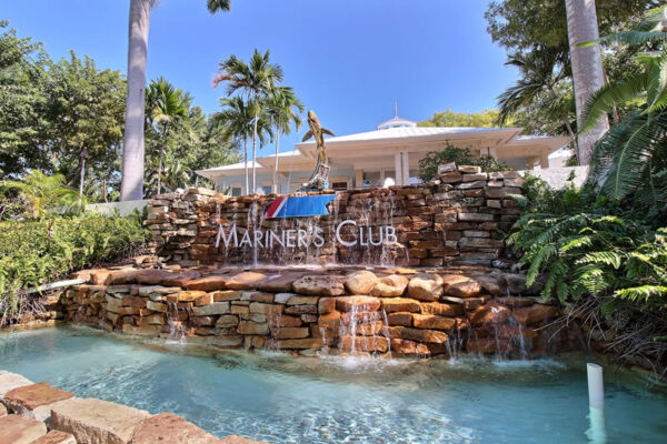 A picture of a waterfall feature in front of the Club House at Mariner's Club Key Largo.